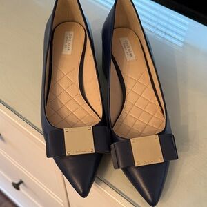 Cole Haan Navy Heels with Gold Bow Detail